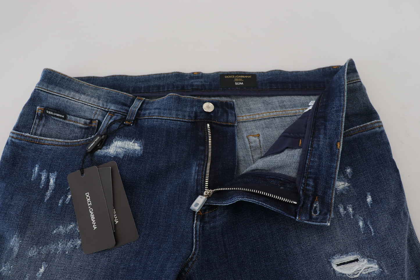 Blaue Dolce &amp; Gabbana-Jeans aus zerfetztem Baumwoll-Stretch-Slim-Denim